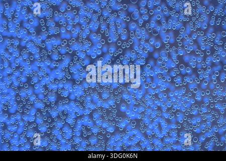 Highly detailed texture of gaseous liquid with sparkling blue bubbles, Hiei, Japan Stock Photo