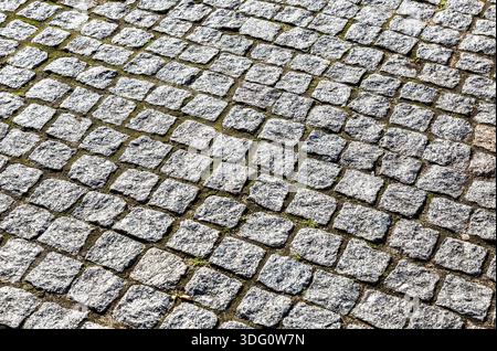 Abstract background of cobblestones making from rough stone blocks Stock Photo