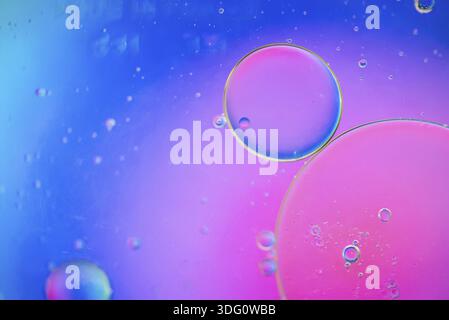 Oil drops in water. Abstract psychedelic defocused pattern image multicolored. Abstract background with colorful gradient colors. DOF Stock Photo