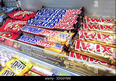 Samara, Russia - May 25, 2019: Twix and snickers chocolate bars on store shelf Stock Photo