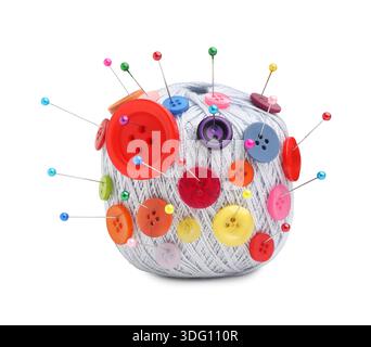 Ball of yarn with pins and buttons isolated on white Stock Photo