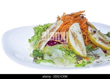 Fresh salad decoration. lettuce, carrots, red beets, chopped apples with dressing in ceramic plate, isolated on white background Stock Photo