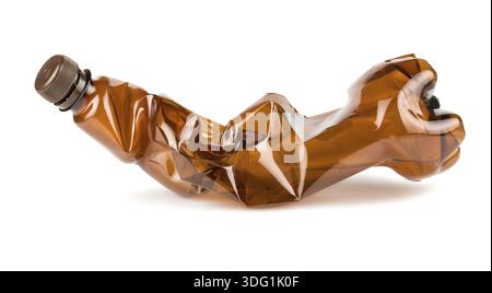 Crumpled brown plastic bottle isolated on white background Stock Photo
