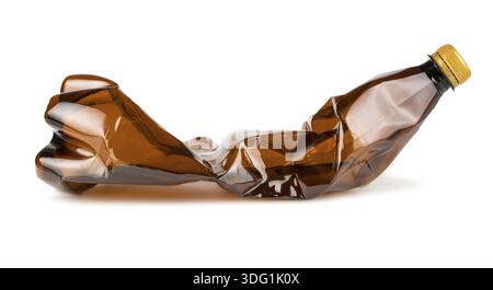Crumpled brown plastic bottle isolated on white background Stock Photo