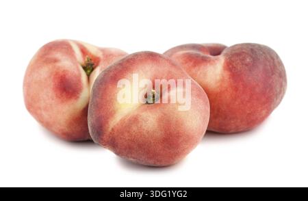 Three paraguayos flat peaches isolated on white background Stock Photo
