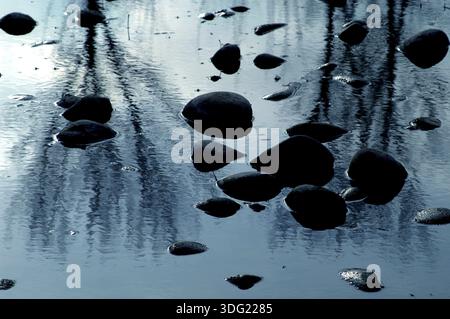 USA, Idaho, Boise, Rocks in the Boise River Stock Photo