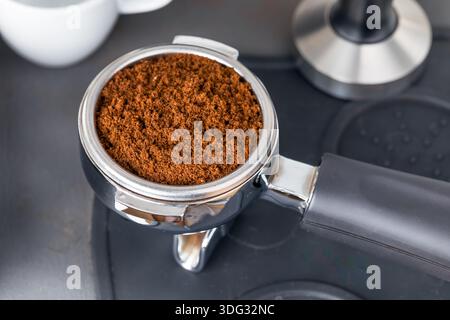 Organic Ground Espresso Coffee in a Portafilter Ready to Brew Stock Photo