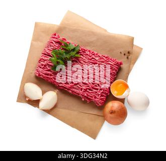 Fresh ground meat with parsley, onion and eggs on white background Stock Photo