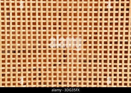 Wooden texture with decorative lattice pattern as background Stock Photo