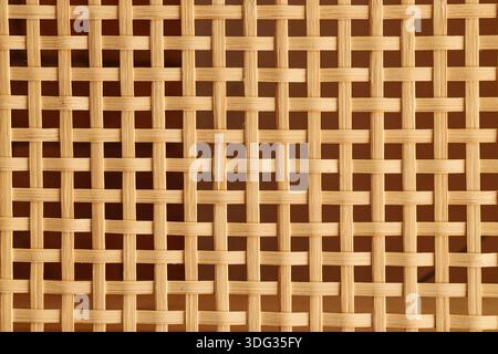 Wooden texture with decorative lattice pattern as background, closeup Stock Photo
