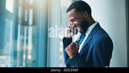 Investor, phone call and black man in office, fist pump and excited for stock market exchange. African person, profit growth and financial advisor in Stock Photo