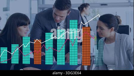 Analyzing market data, trio in business attire leaning over laptop at office, with overlaid charts Stock Photo