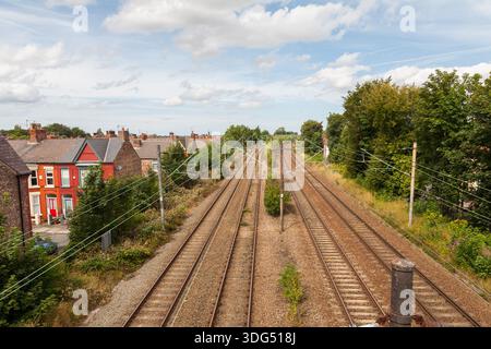 Railway tracks through residential Liverpool Stock Photo