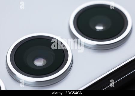 Modern smartphone camera lens, macro view. close up. Stock Photo