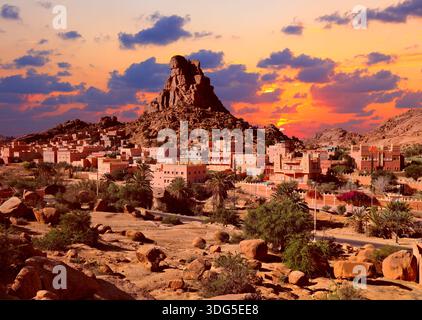 Sunset in Morocco. Napoleon's Hat rock (Chapeau Napoleon) in Tafraoute, Morocco. Landscapes of Antiatlas mountains in Morocco. Stock Photo