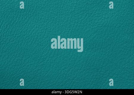 Teal leather texture fills the frame with detailed leather grain and clean leather surface. Natural background for mockup, copy space, branding Stock Photo