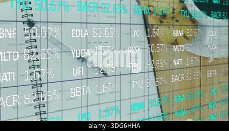 Displaying spiral notebook with black pen on wooden desk with printed planner sheet, ticker overlay Stock Photo