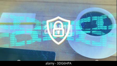 Displaying holographic shield padlock hovering over wooden desk, showing cyan code, coffee cup Stock Photo