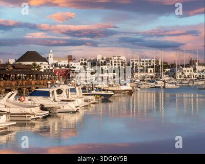Marina Rubicon Lanzarote luxury marina and restaurants in warm late tranquil calm afternoon sunset Playa Blanca Lanzarote Canary Islands Spain Stock Photo