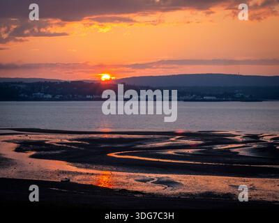 Sunset over the Annapolis Basin off the Bay of Fundy from Smiths Cove in the Digby area on the northwestern shore of Nova Scotia Canada Stock Photo
