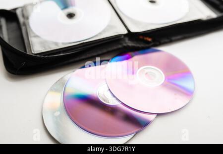 Bunch of CD and DVD discs organized in a disc holder. Stock Photo