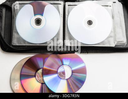 Bunch of CD and DVD discs organized in a disc holder. Stock Photo