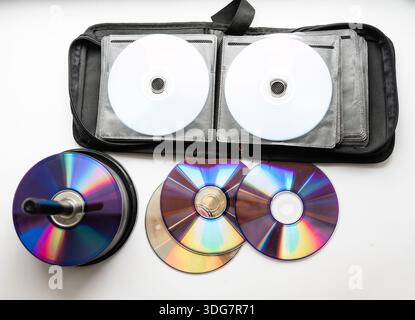 Bunch of CD and DVD discs organized in a disc holder. Stock Photo