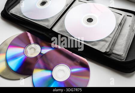 Bunch of CD and DVD discs organized in a disc holder. Stock Photo