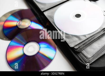 Bunch of CD and DVD discs organized in a disc holder. Stock Photo