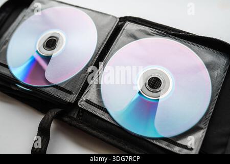 Bunch of CD and DVD discs organized in a disc holder. Stock Photo