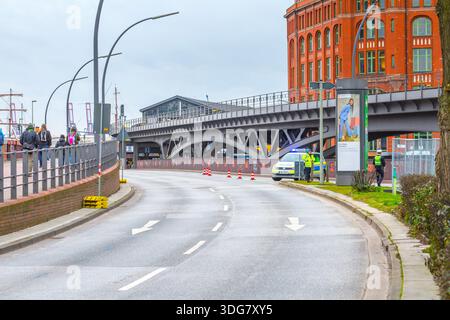 Hamburg, Germany – Feb 21, 2020: Police patrol car blocks road under Baumwall U-Bahn bridge near Speicherstadt district during Fridays for Future clim Stock Photo