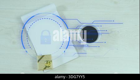 Displaying closed white notebook bearing blue lock overlay on light wood desk, gold gift and coffee Stock Photo
