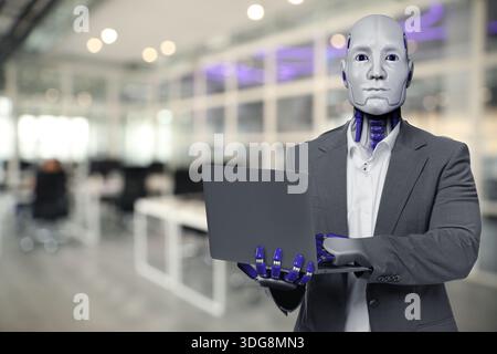 Robot as businessman using laptop in office. Future technologies in everyday life Stock Photo