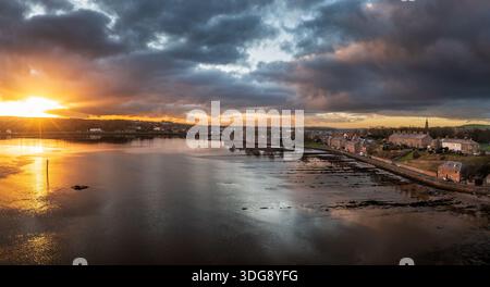The Sun setting over the River Tweed estuary at Berwick. Stock Photo