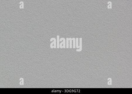 Mid gray sample textured background plain solid material color copy space. Stock Photo