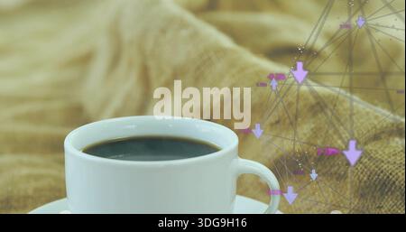Showing white cup holding black coffee on saucer on draped tabletop with purple graphic, copy space Stock Photo