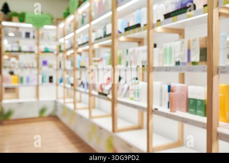 Pharmacy Shelves Displaying Assorted Skincare and Health Products Indoors Stock Photo