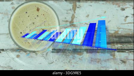Showing clear glass cup with foam, glass handle on worn wooden table, projecting blue 3D bars Stock Photo