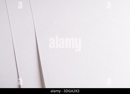 White texture paper background. Smooth woven surface with geometric overlap and fine lines in refined detail. Minimal elegant structure for document, Stock Photo