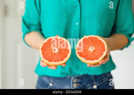 Beautiful Ruby Red Grapefruit Cut in Half Stock Photo