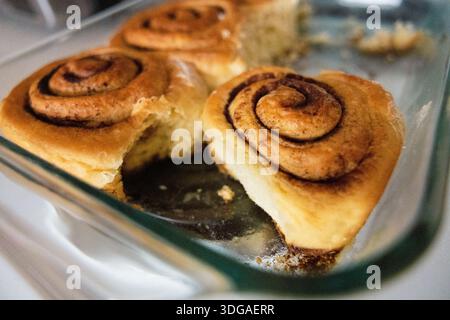 Freshly Baked Bliss: Warm Cinnamon Rolls Straight from the Oven Stock Photo
