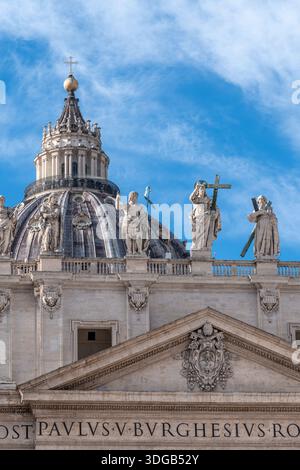 Statues of Jesus Christ and his apostles atop the façade of St. Peter's Basilica in the Vatican, the most important religious building in catholicism Stock Photo