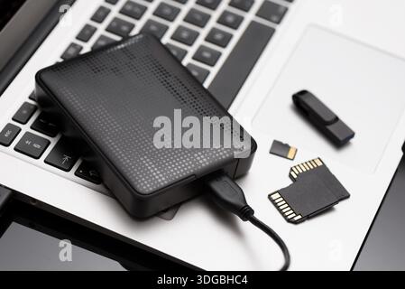 Multiple storage devices, data security, digital data storage Stock Photo