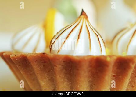 Golden Crust with Citrus Clouds, Tangy Lemon Meringue Tart Stock Photo