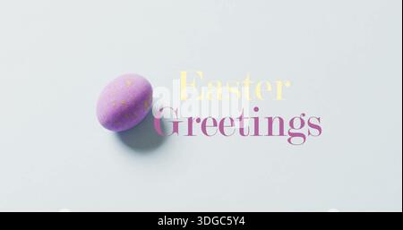 Image of happy greetings text over purple easter egg on bue background Stock Photo