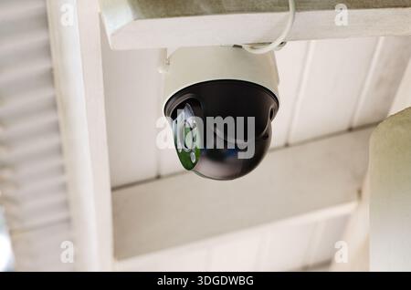 Close up of a security camera installed at home. Stock Photo