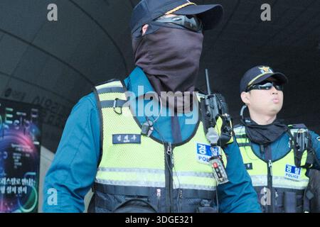 Angola Riot Police Riot police officers in protective gear surround a group of ...