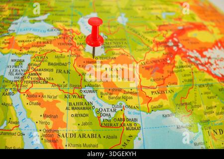 iran country, in asia continent, pinned with a red pin on the globe Stock Photo