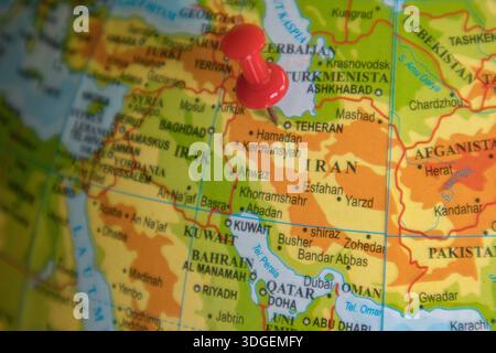 iran country, in asia continent, pinned with a red pin on the globe Stock Photo