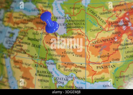 iran country, in asia continent, pinned with a red pin on the globe Stock Photo